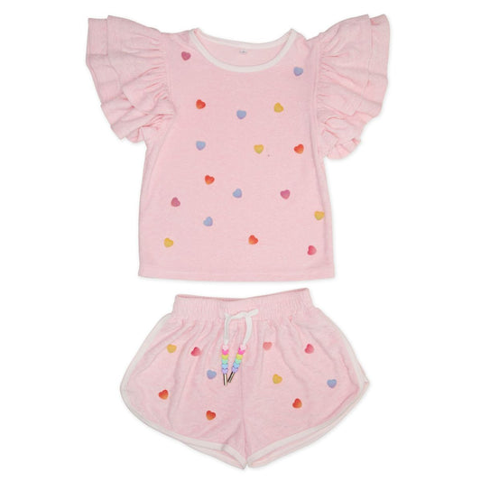 Pink children's outfit with ruffled sleeves and colorful heart patterns on a white background