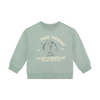 Light green sweatshirt with Taco Tuesday graphic design on back