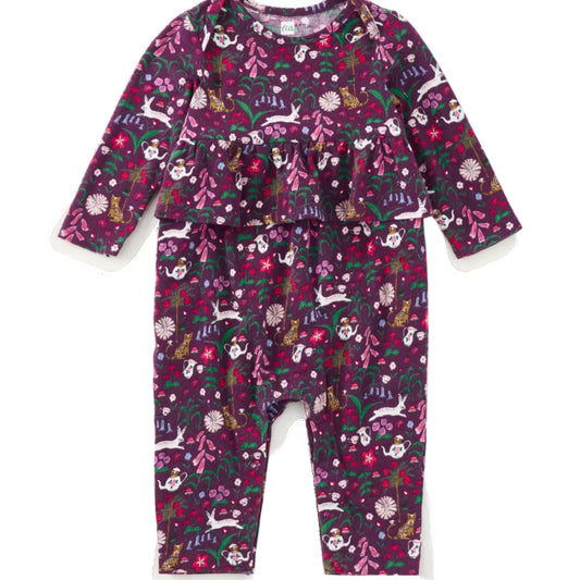A baby long-sleeve romper with an all-over whimsical print of rabbits, flowers, and leaves in purple, pink, green, and white, shown flat on a white background.