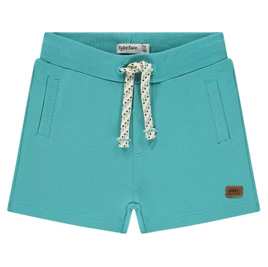 Teal shorts with a drawstring and pockets