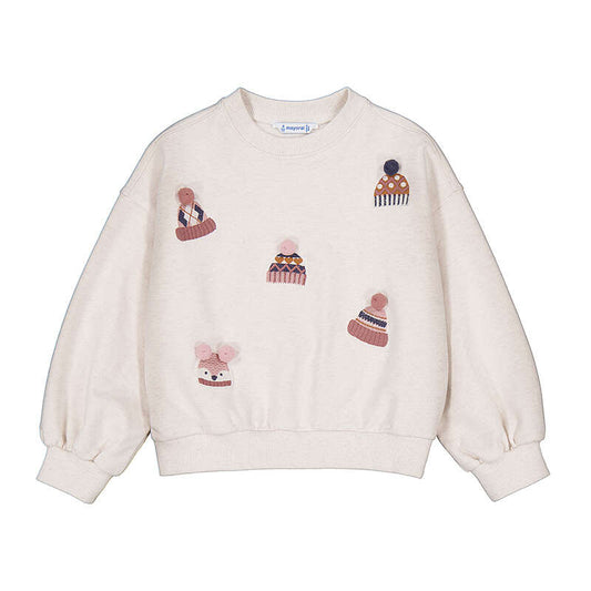 Beige sweatshirt with embroidered hats on a white background
