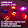 Six colorful light-up emergency vehicle toys on white background