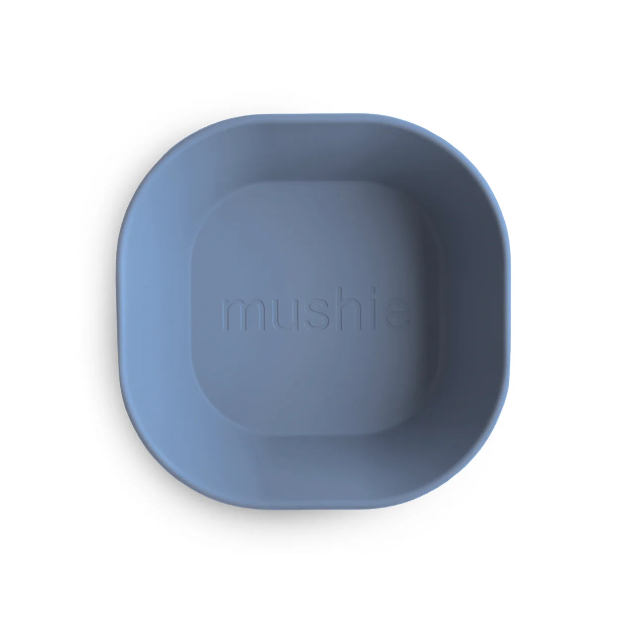 Blue bowl with 'mushie' branding on a white background