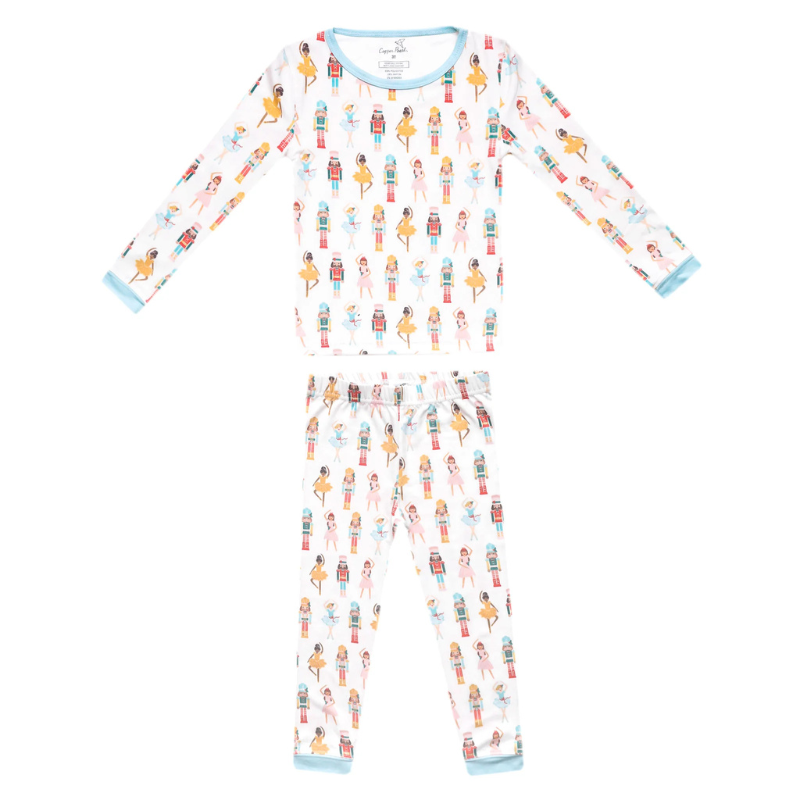 Children's pajama set with nutcracker pattern on a white background