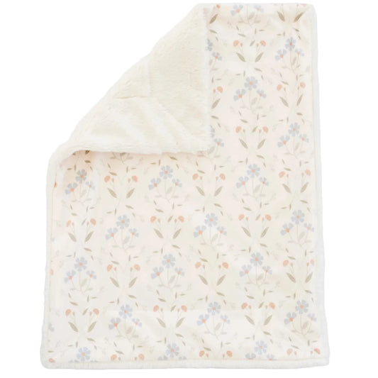 Floral patterned blanket on a white background