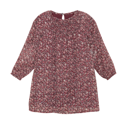 A floral patterned dress in wine and pink colors with a round neckline and 3/4 sleeves.
