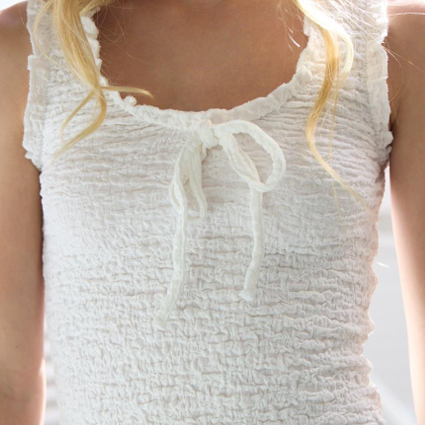 white tank top with bow in center