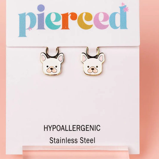 Dog-shaped earrings on a 'pierced' branded card with hypoallergenic information.
