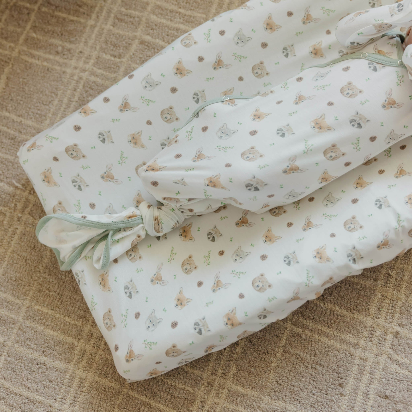 White baby knotted gown with woodland animal prints