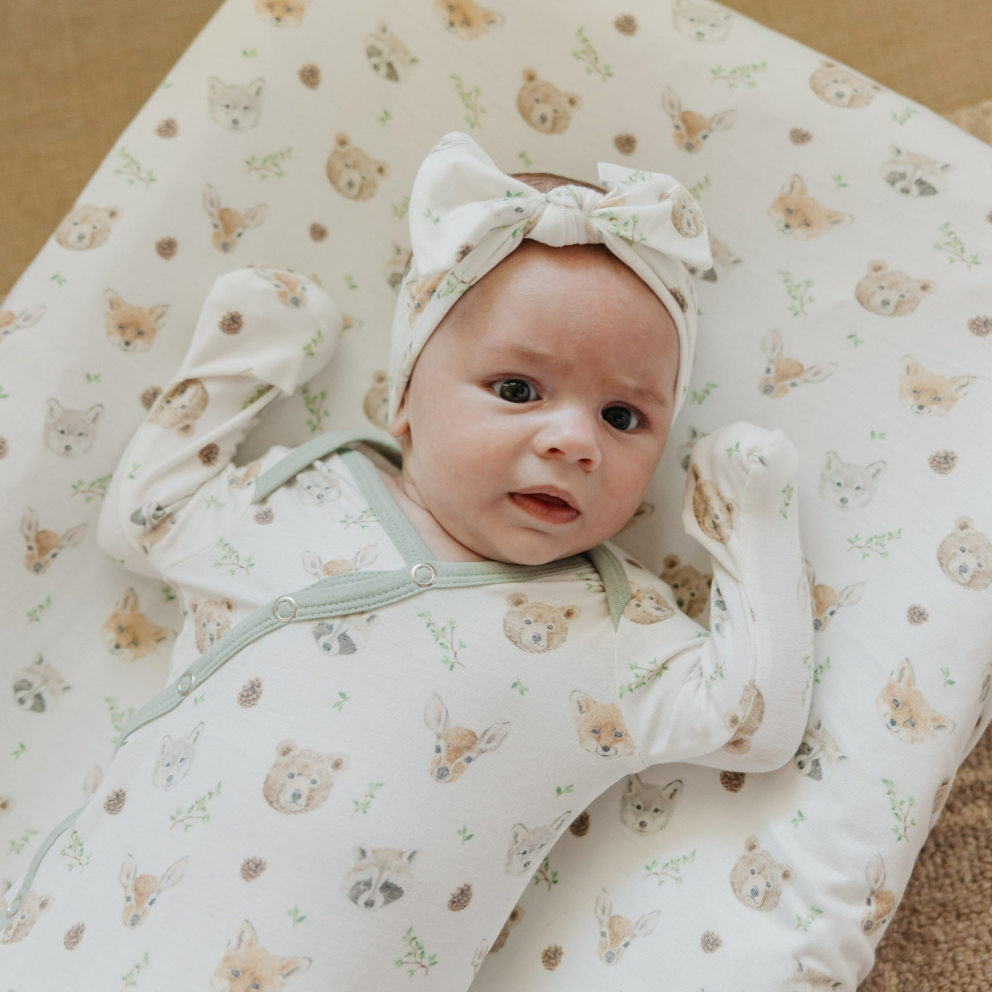 White baby knotted gown with woodland animal prints