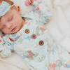 Dinosaur print baby gown with knotted bottom