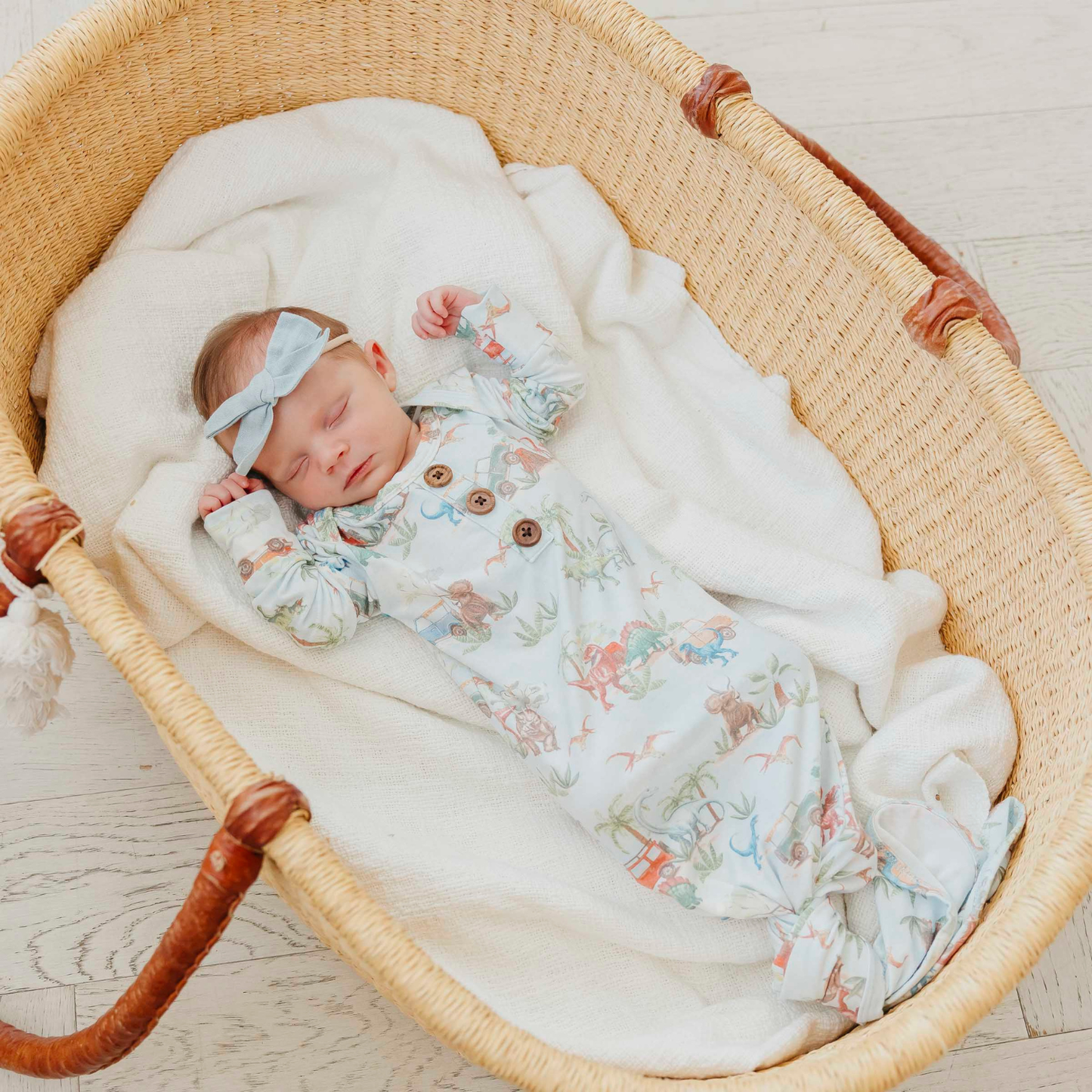 Dinosaur print baby gown with knotted bottom