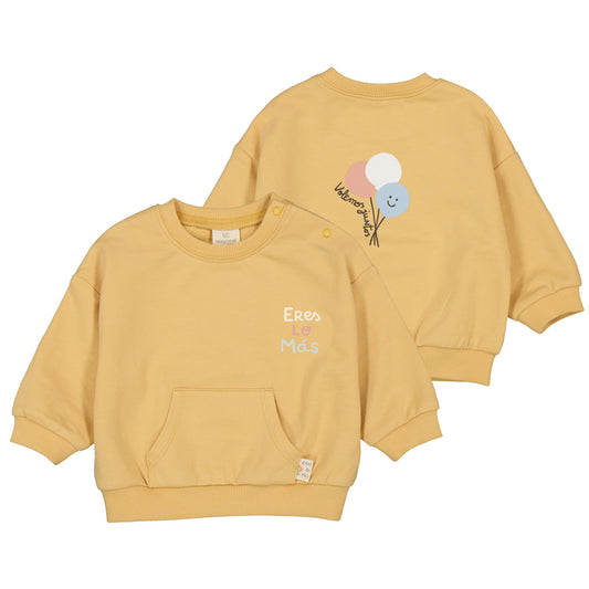 Yellow sweatshirt with text "You Are The Most" and balloon design 