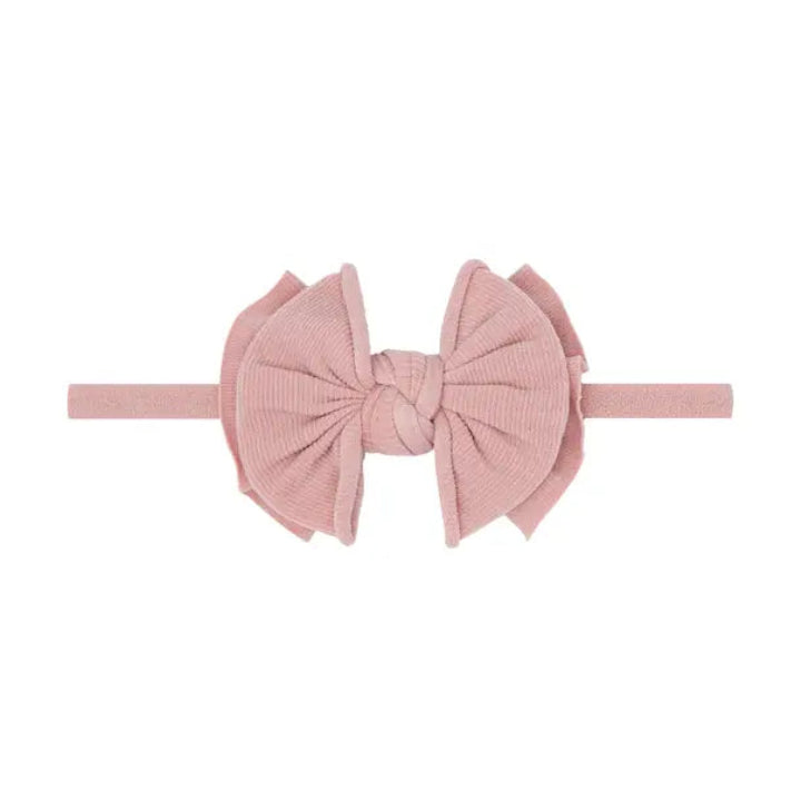 Pink headband with a bow