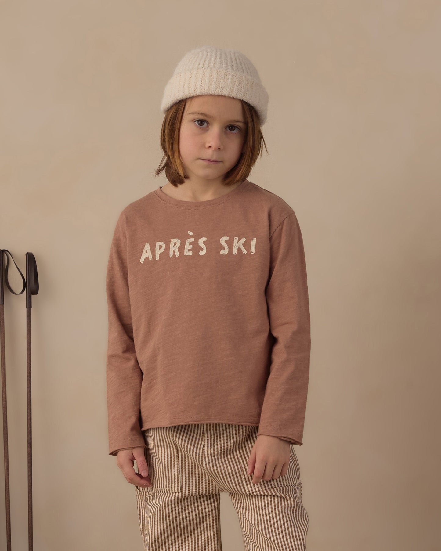 Studio shot of the Apres Ski Raw Edge Top showing the raw hem detail