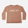 Boy wearing the Apres Ski Raw Edge Top, a clay-colored long sleeve tee with a spot print