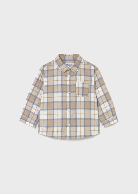Plaid shirt with beige, blue, and white pattern on a light gray background