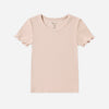 Girl wearing the Blush Ribbed Basic Tee with a scoop neckline