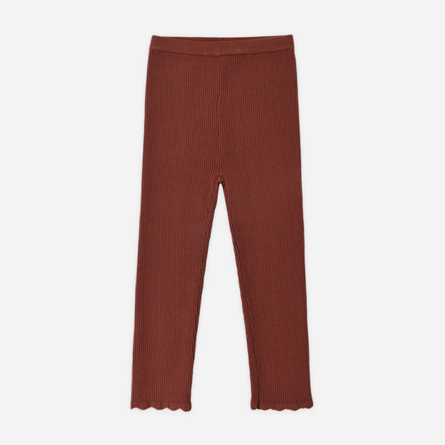 Girl wearing the Brick Check ribbed leggings