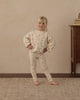 Child playing outdoors in the Butterfly Ditsy Spongey Set