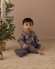 Slate fair isle baby romper with a front button placket