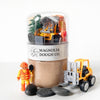 Toy construction set with a container labeled 'Magnolia Dough Co.' on a white background