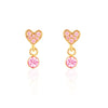 Heart-shaped earrings with pink gemstones on a white background