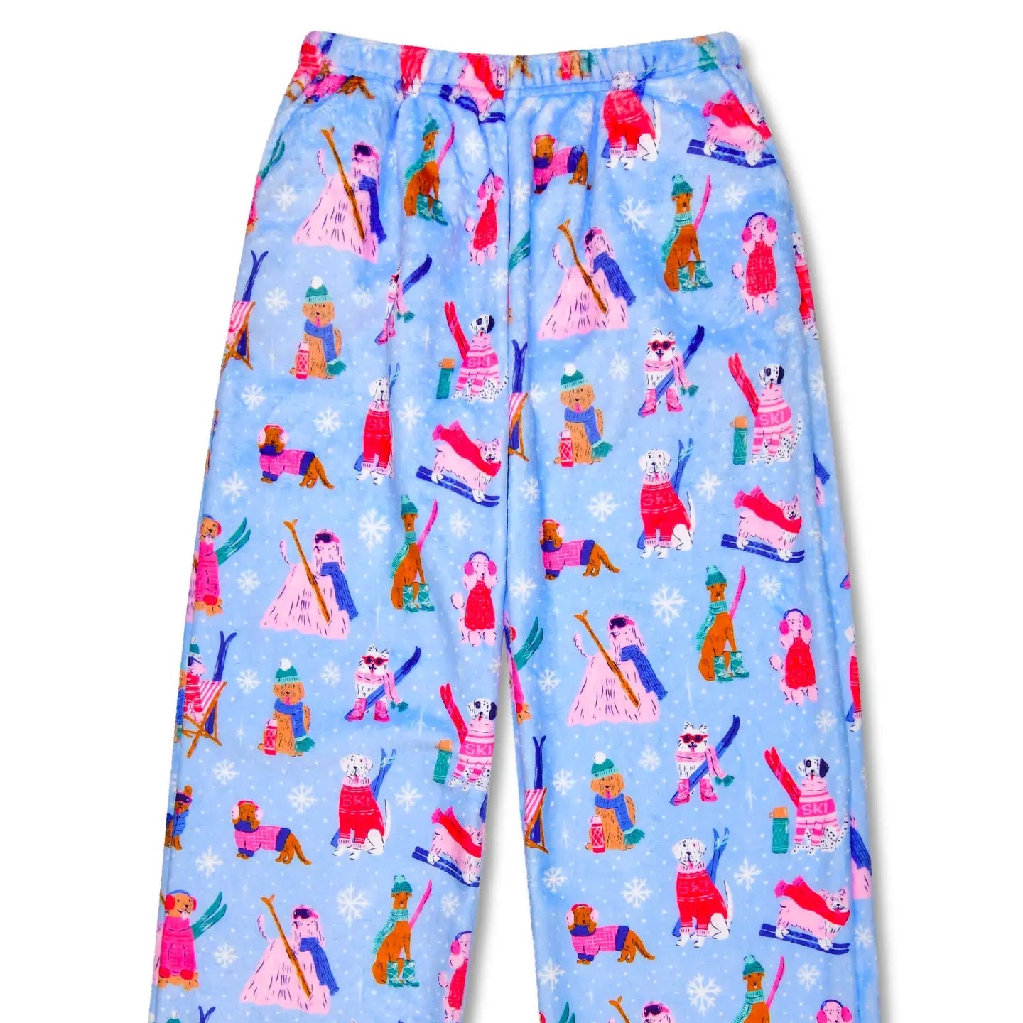Colorful children's pajama pants with winter-themed pattern on a white background