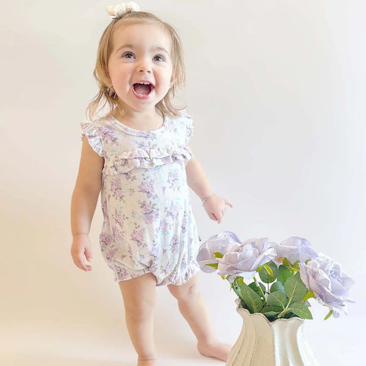 short sleeve, light purple ruffle romper with purple flower all over print