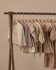 Flat lay of the Fawn Luna long sleeve top in natural fawn print