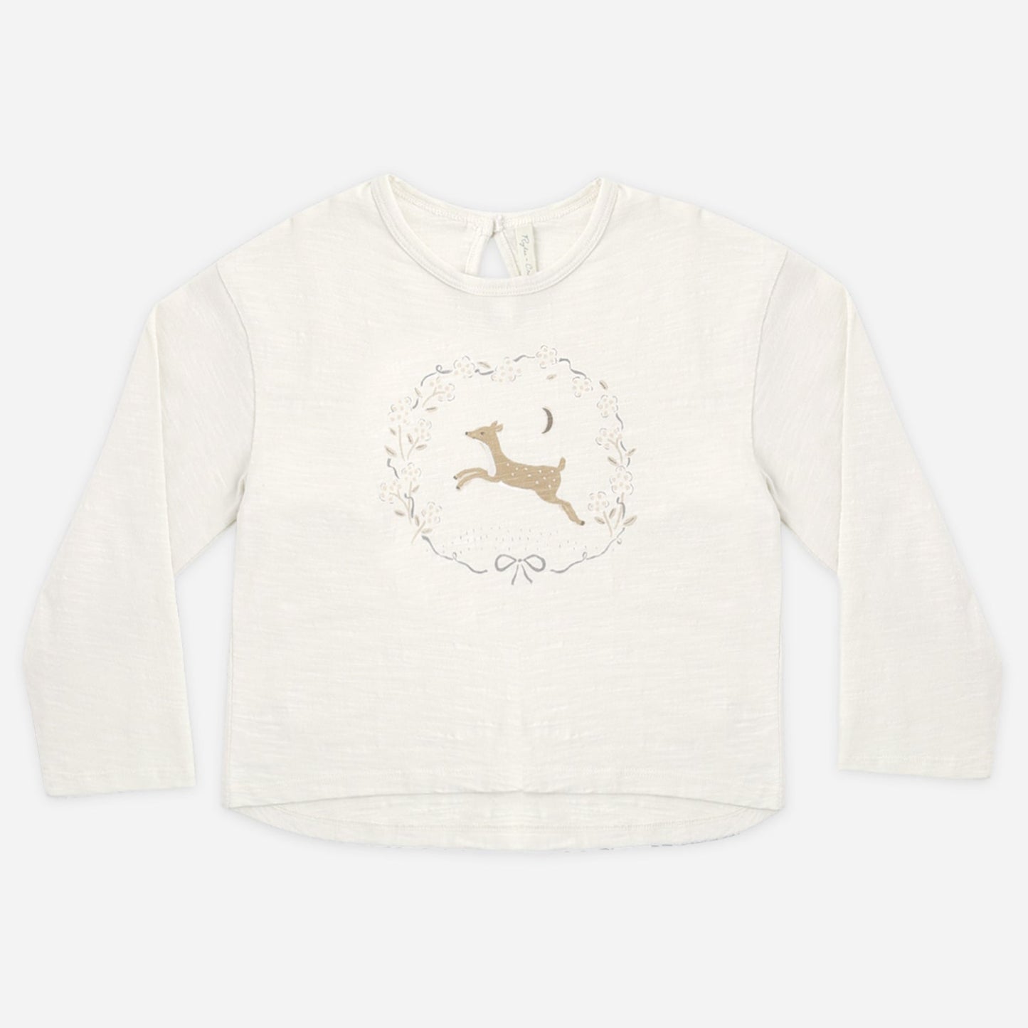Girl wearing the Fawn Luna long sleeve top with a playful fawn spot print