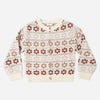 Flower fair isle knit cardigan laid flat showing marble buttons