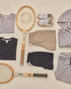 Flat lay of the Heather Black Cove Tee showing the crew neckline