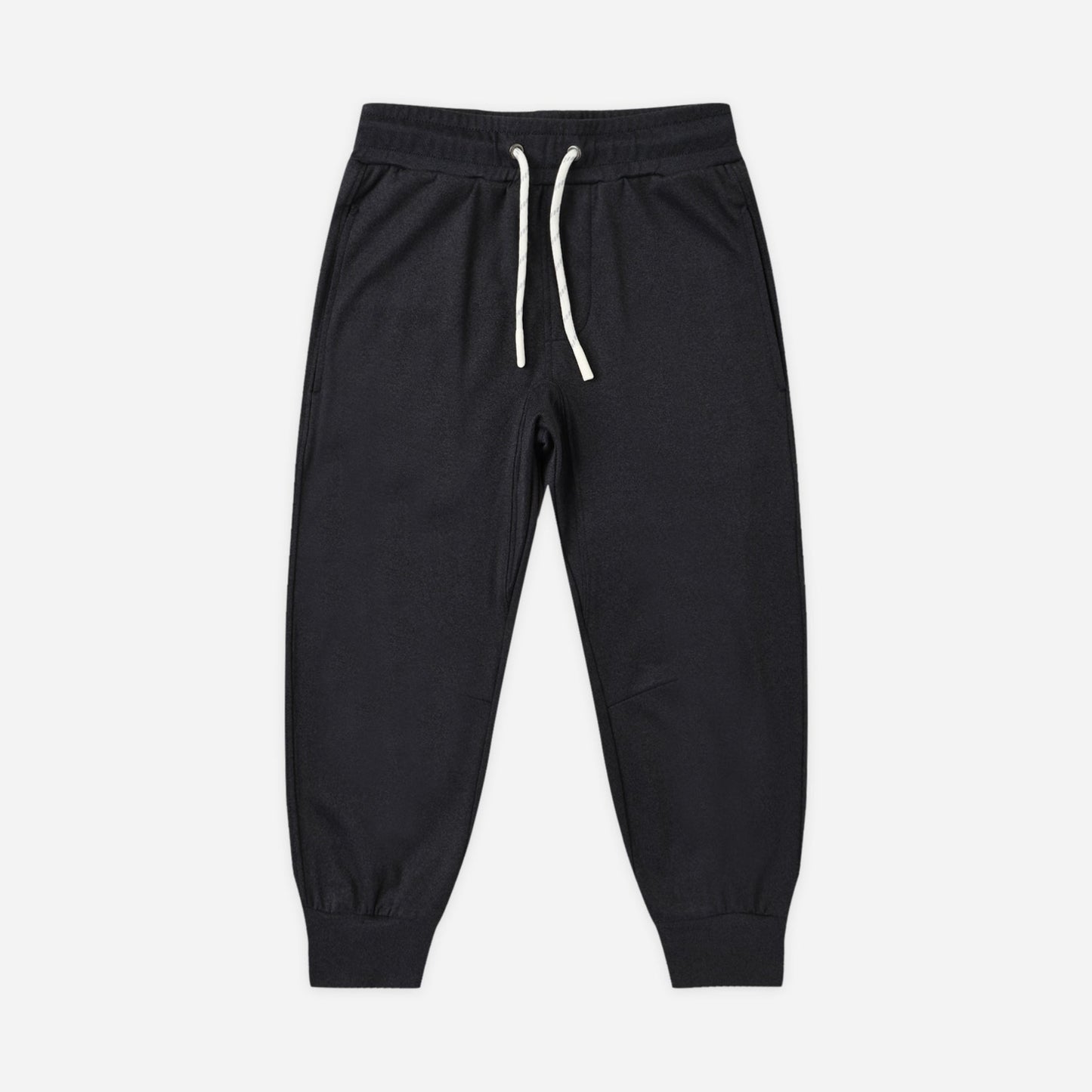 Child wearing the Heather Black Tech Jogger, a relaxed fit black jogger
