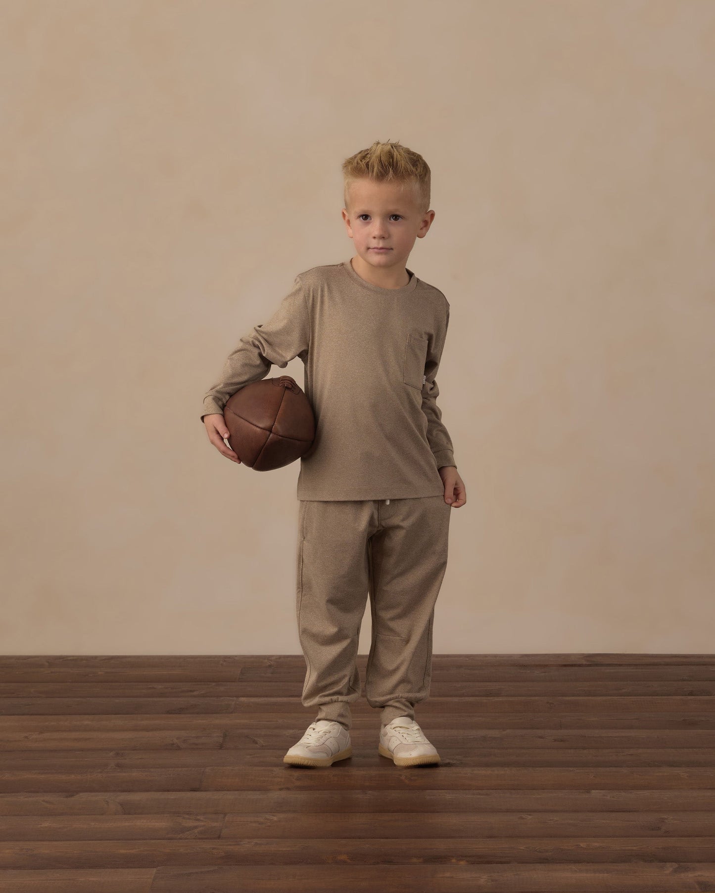 Flat lay of the Heather Olive Pocket Tee showing the chest pocket detail