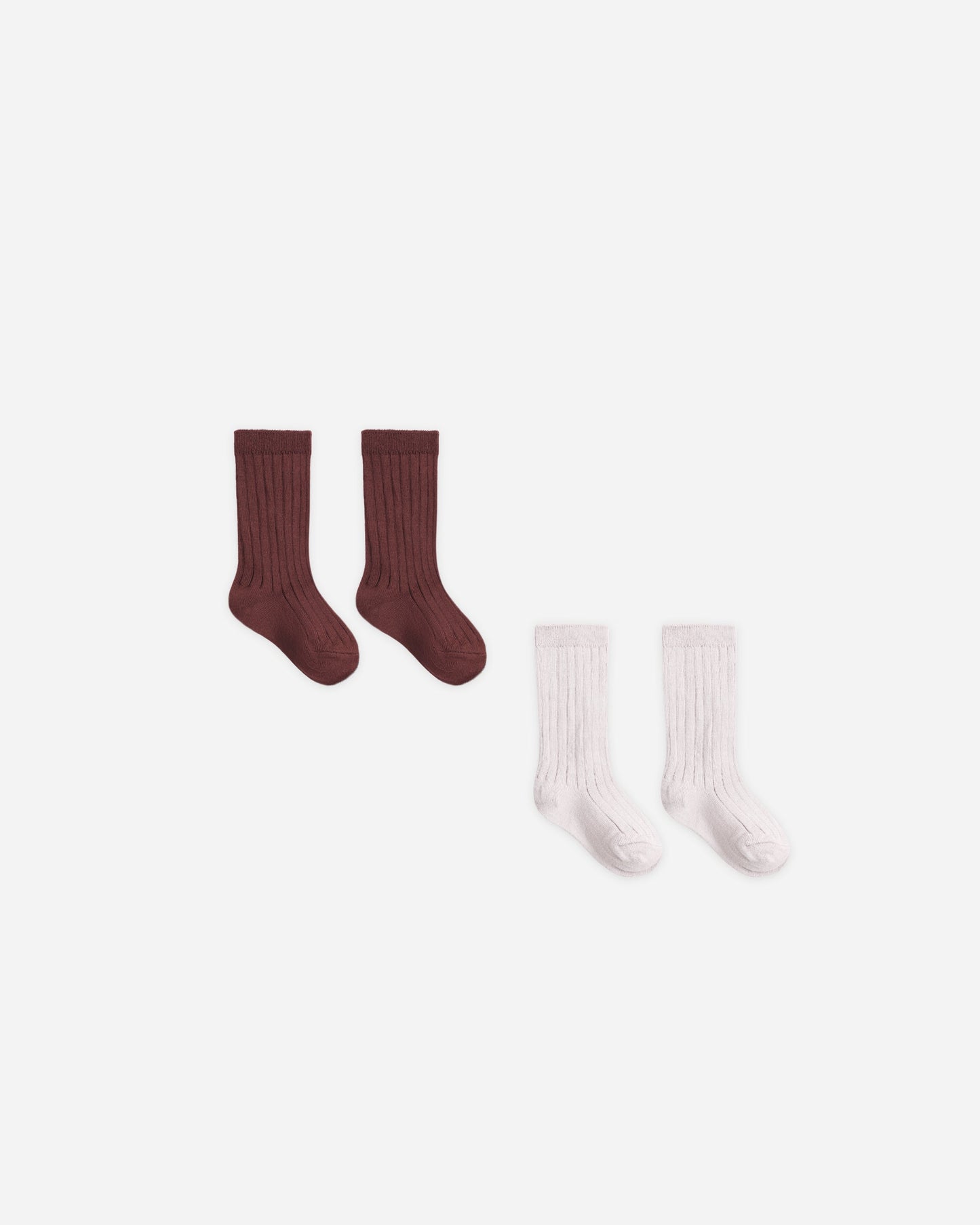 Baby wearing Quincy Mae Lilac Mist and Black Cherry socks set