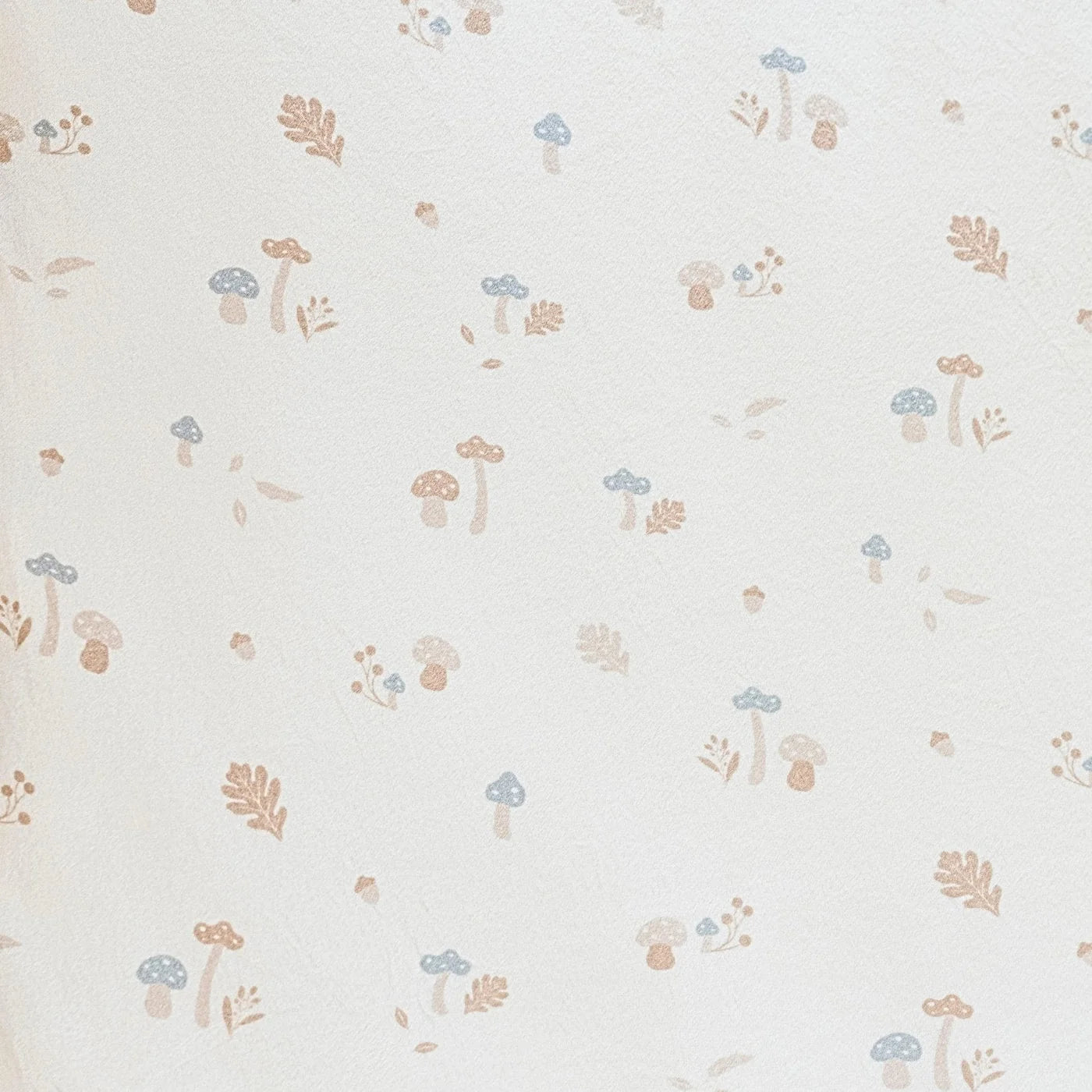 Pattern of small mushrooms and flowers on a light blue background