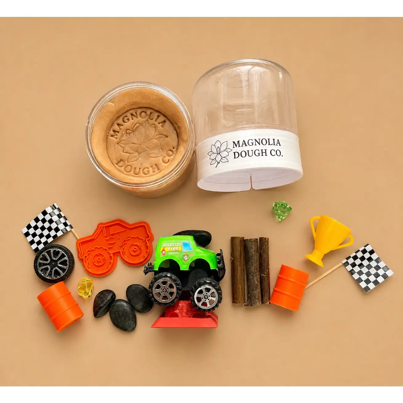 Dough playset with containers, tools, and accessories on a beige background