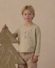 Baby wearing the snow day long sleeve tee