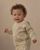 Baby in the polar bears set outdoors