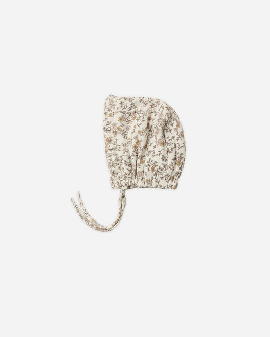Baby wearing Quincy Mae Posy woven ruffle bonnet