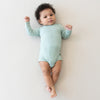 Sage Long Sleeve Bodysuit - Kyte Baby, flat lay