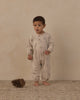 Baby wearing the skiing penguins henley romper