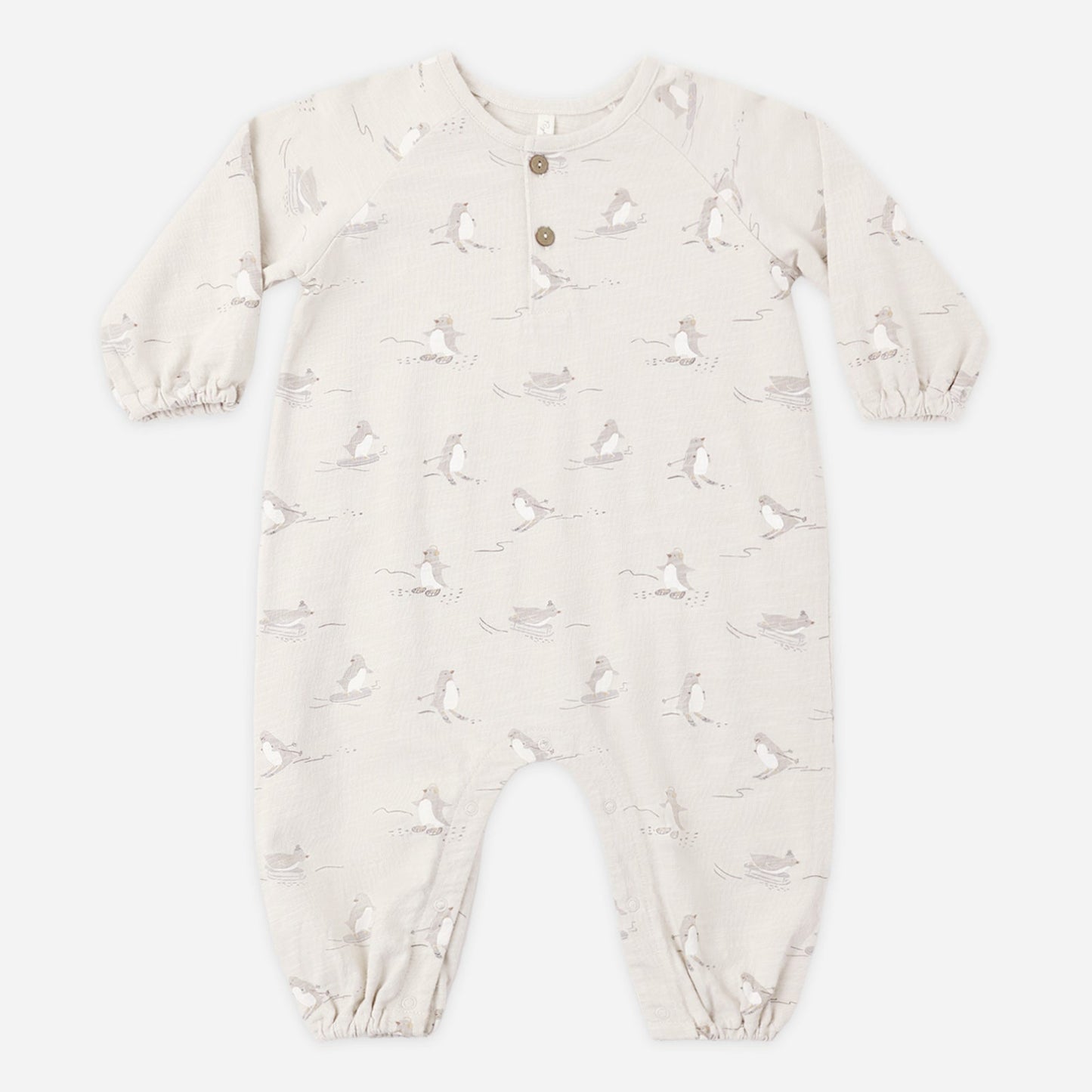 Skiing penguins henley romper by Rylee and Cru laid flat