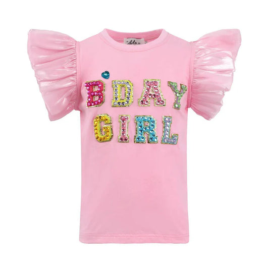 Pink t-shirt with 'B'DAY GIRL' text and colorful bedazzled letters