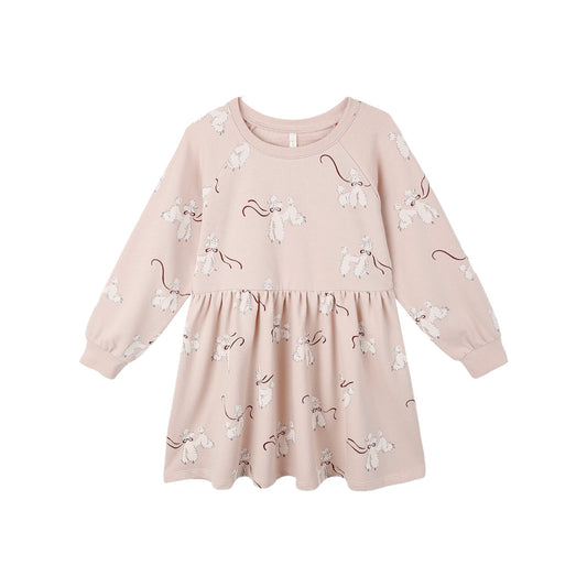 Pink dress with poodle dog pattern on a white background