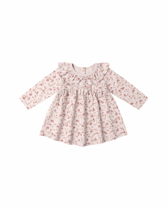 Floral dress with long sleeves on a white background
