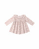 Floral dress with long sleeves on a white background
