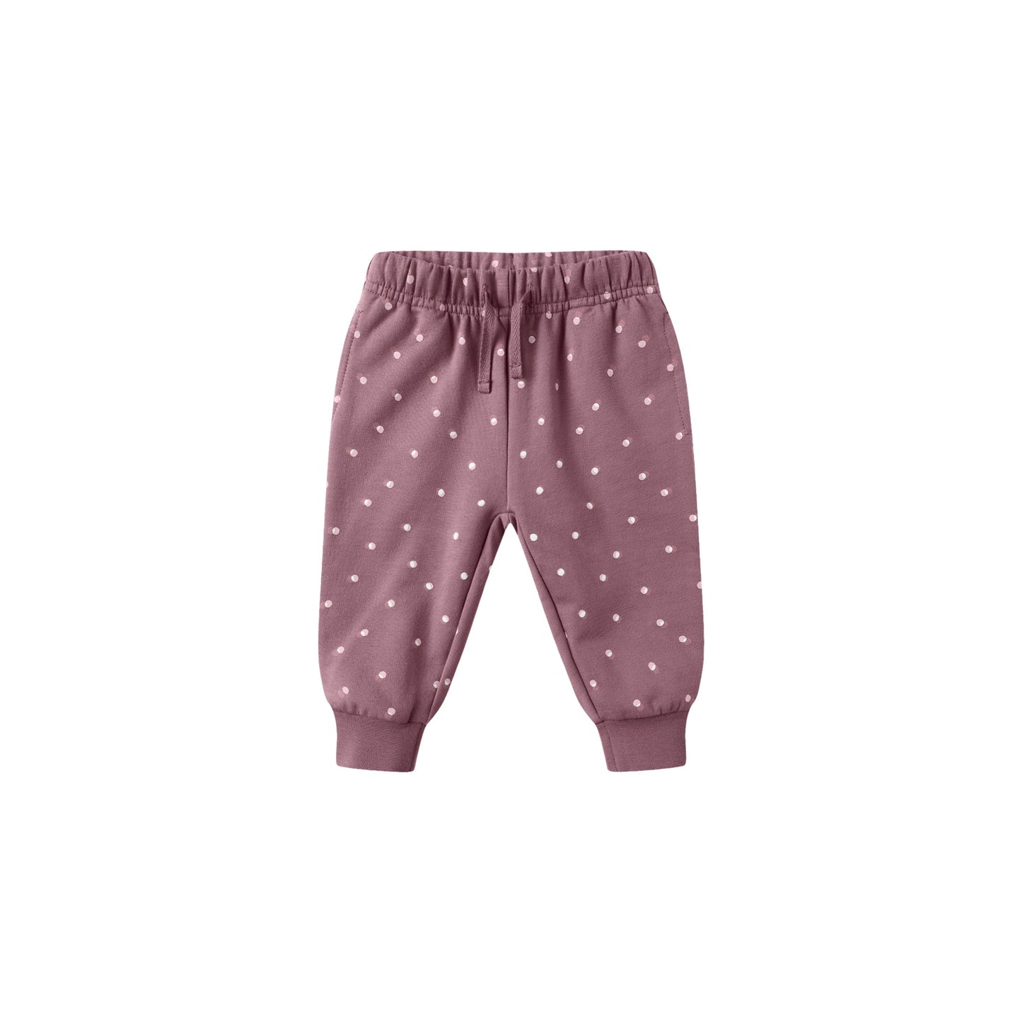Pink baby pants with white polka dots on a white background