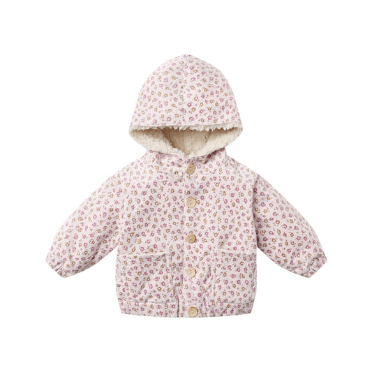 Floral patterned baby jacket on a white background